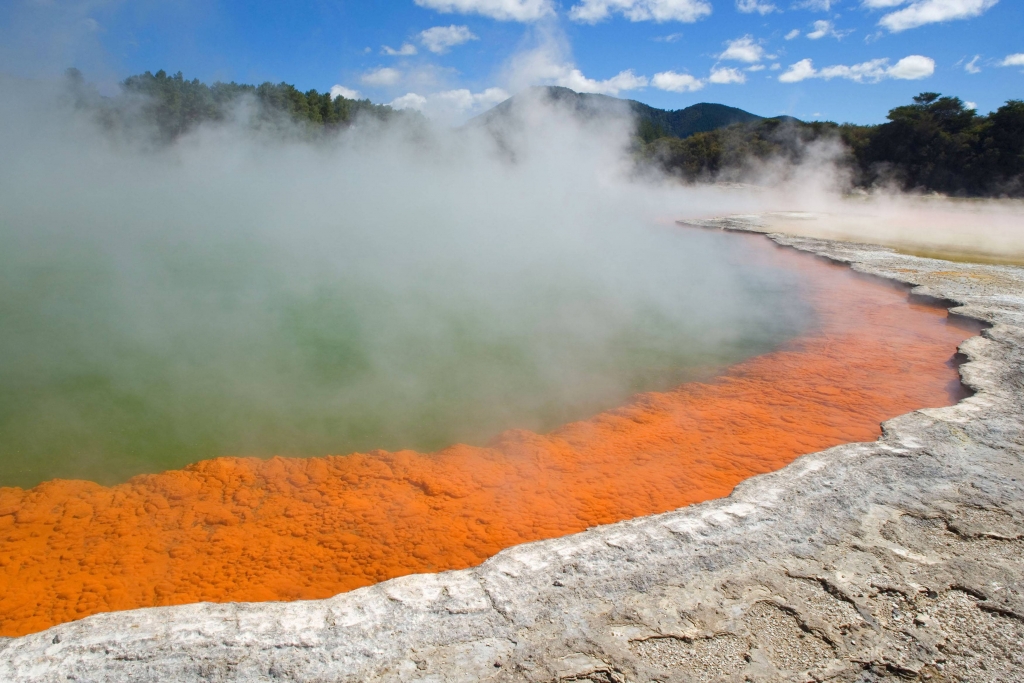 The Champagne Pool - A colorful hot spring in the Waiotapu Geothermal area of New Zealand ...